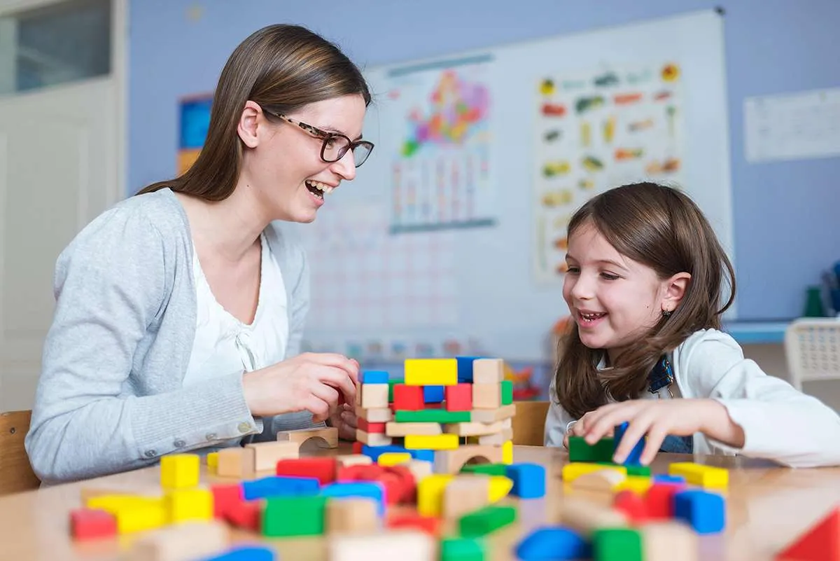 Children building with blocks during therapy at Acorn Autism