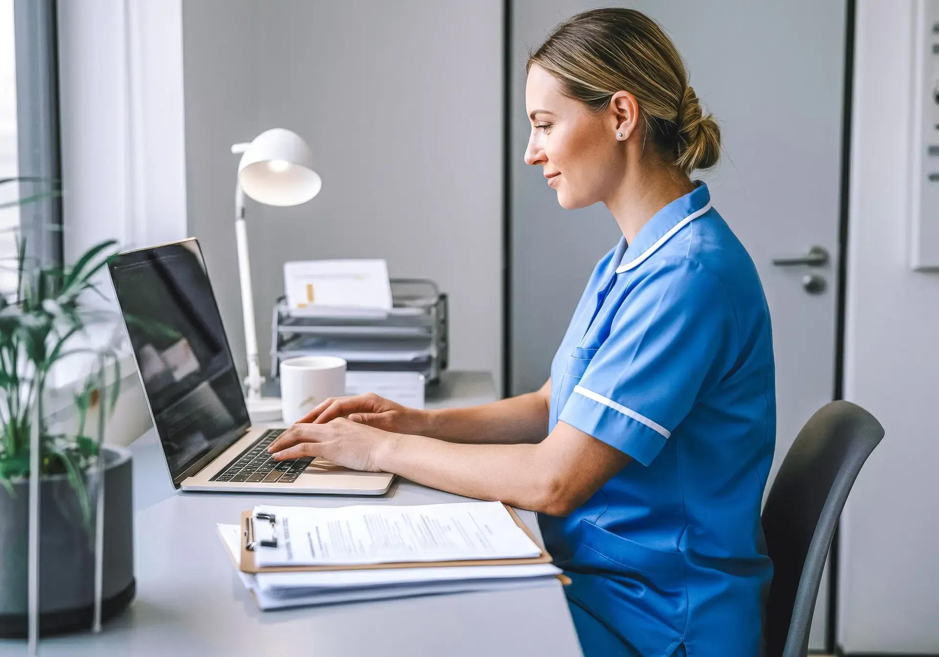 Practitioner reviewing practice management software features